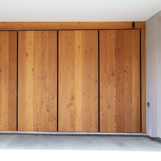 Mehrfamilienhaus Scuol | Seitensektionaltor